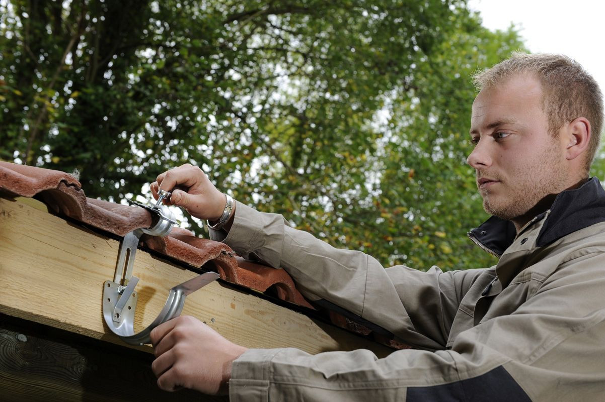 Fixation tuile cuivre